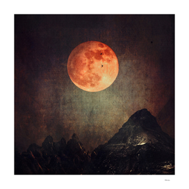 moon over dark mountains