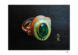 Study of a gold ring with green chalcedony and opals