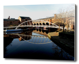 Canal bridge reflection