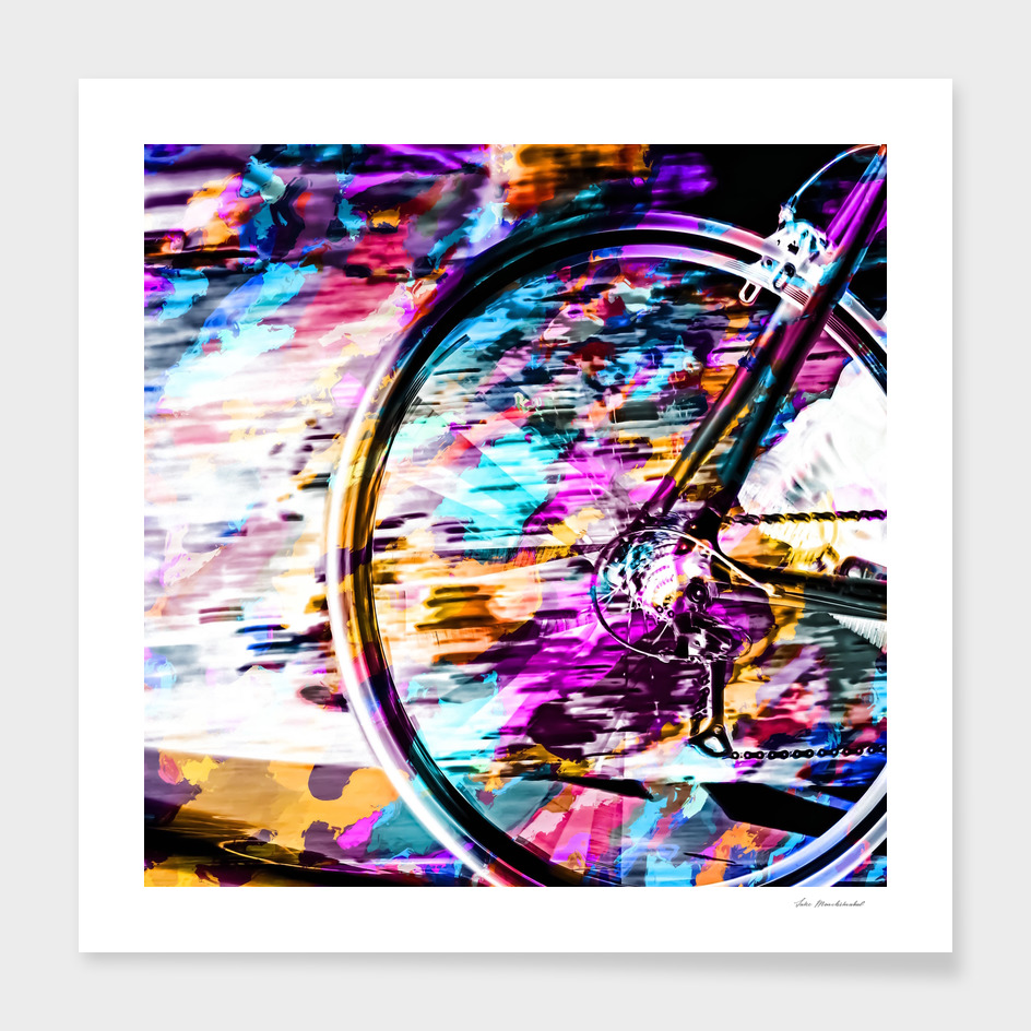 bicycle wheel with colorful abstract background