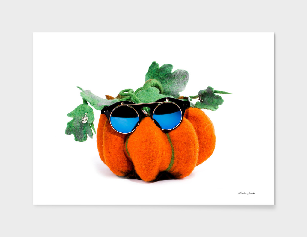 Pumpkin handmade from felted wool in glasses