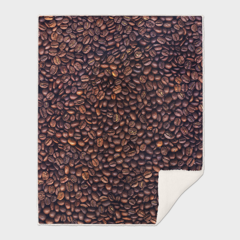 Background of grains of roasted coffee close-up