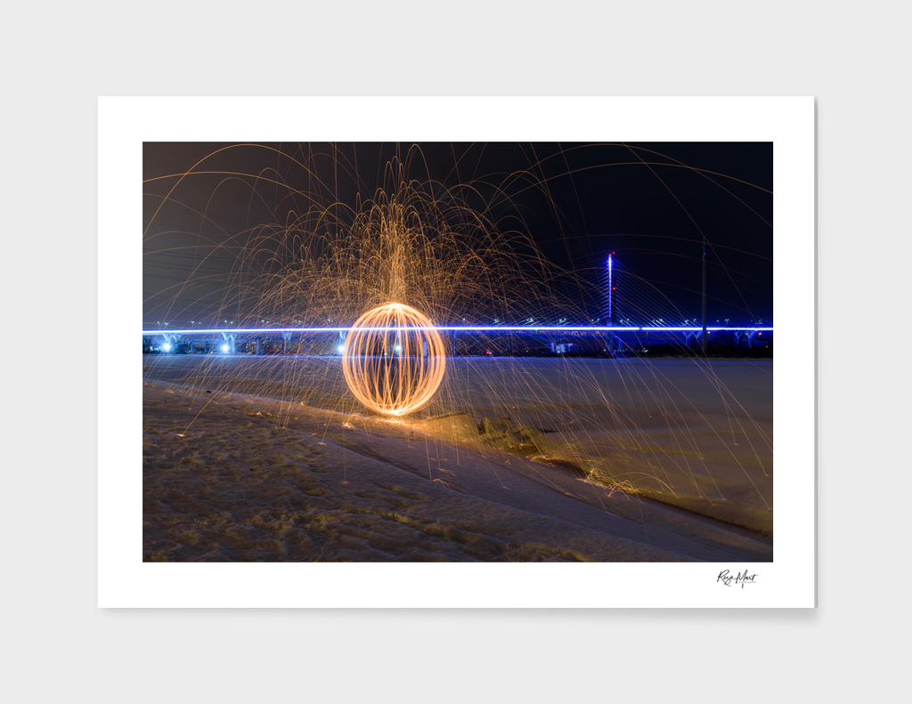 An orb with Champlain bridge background