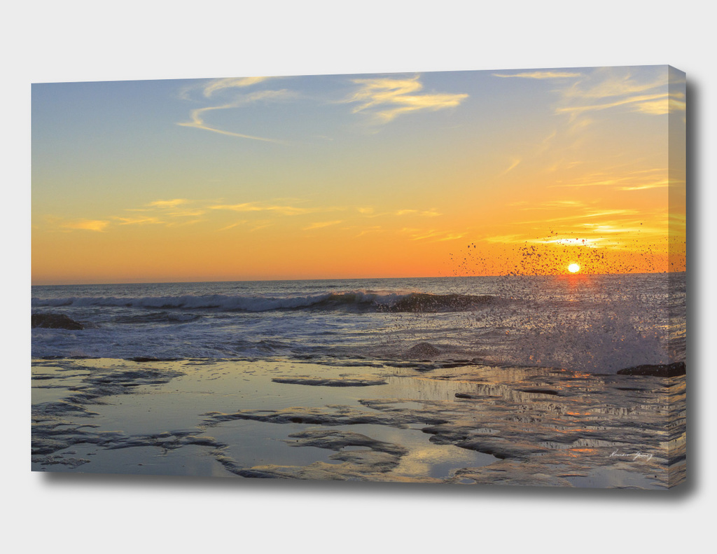 Sunset ocean beach cliffs