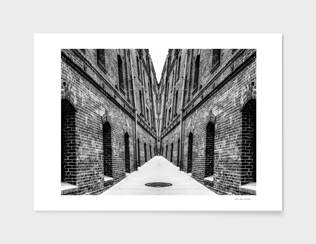 old brick building in black and white