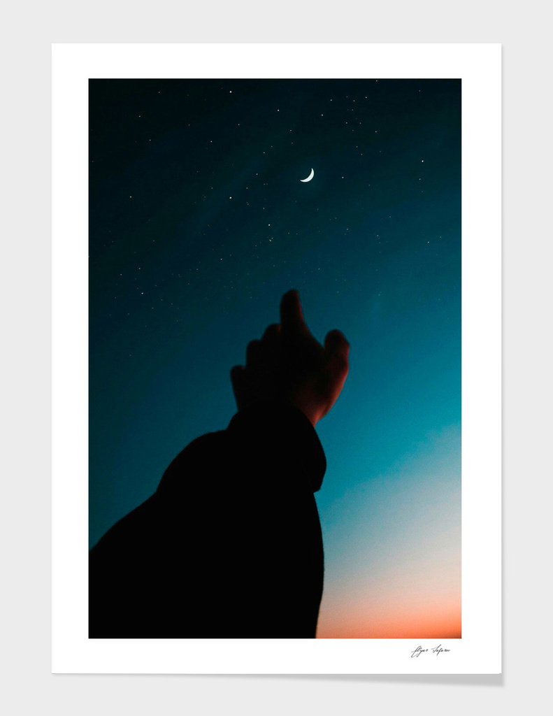 Finger point to moon